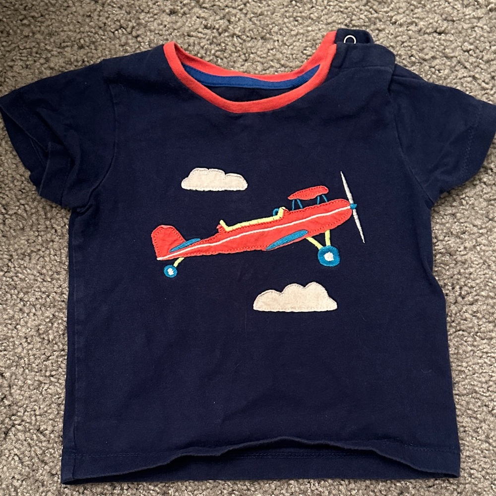 Mini Boden Navy Blue T-Shirt with Red Airplane Design